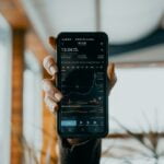 person holding black samsung android smartphone
