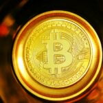 gold and silver round coin