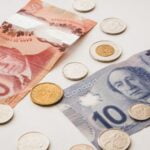 a bunch of money sitting on top of a table