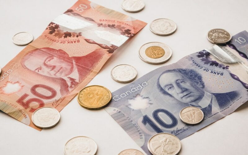 a bunch of money sitting on top of a table