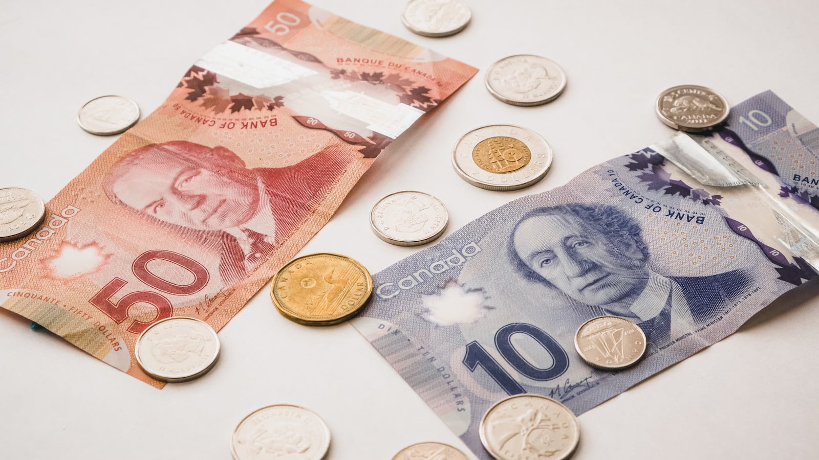 a bunch of money sitting on top of a table